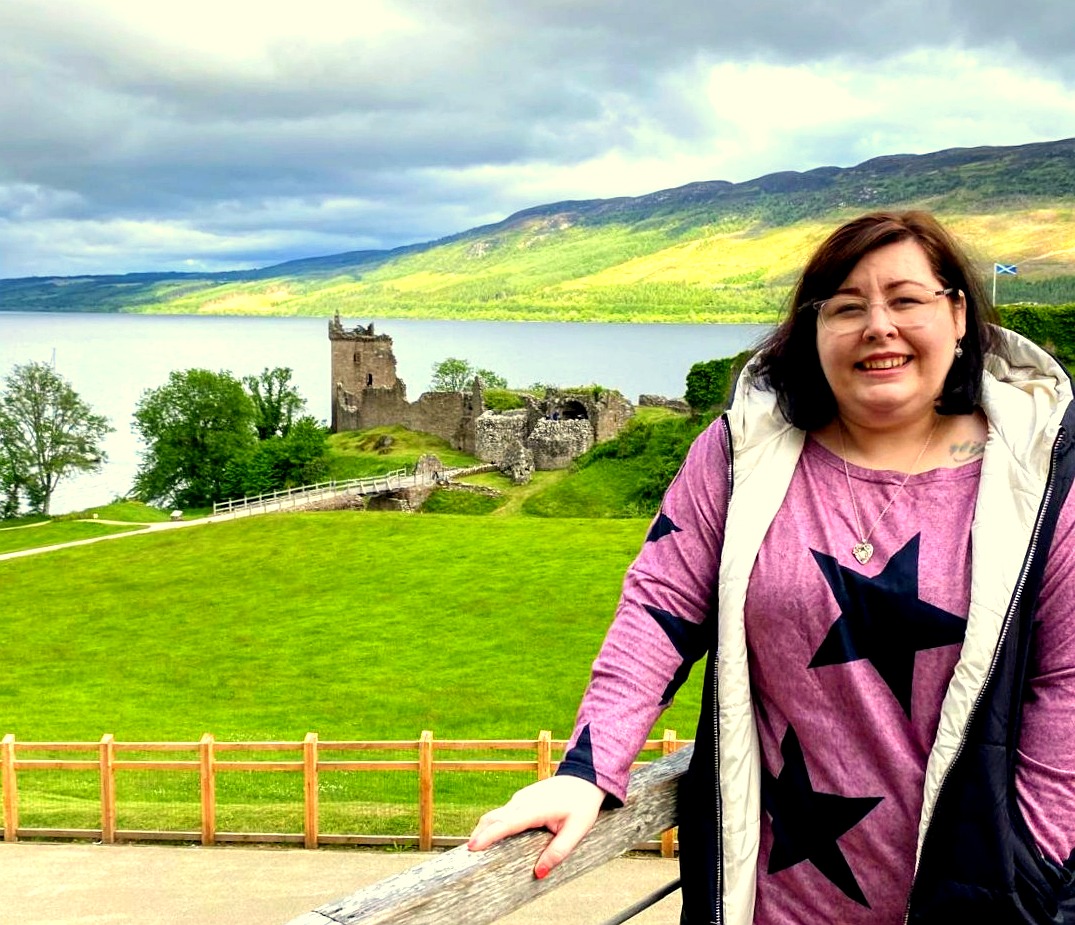 Gemma Pezzack — founder of Beyond Linear ADHD Coaching, at Urquhart Castle, Loch Ness
